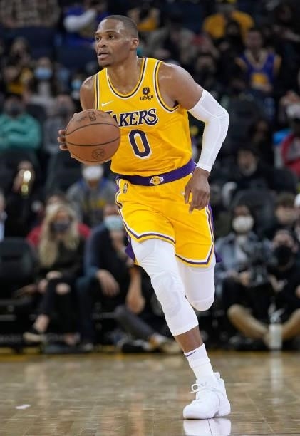 Russell Westbrook of the Los Angeles Lakers dribbles the ball up court against the Golden State Warriors at Chase Center on October 08, 2021 in San...
