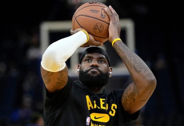 LeBron James of the Los Angeles Lakers warms up prior to the start of the game against the Golden State Warriors at Chase Center on October 08, 2021...