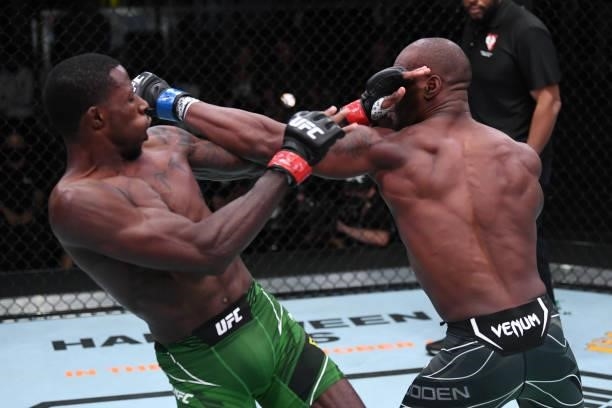 Jared Gooden punches Randy Brown of Jamaica in their welterweight bout during the UFC Fight Night event at UFC APEX on October 09, 2021 in Las Vegas,...