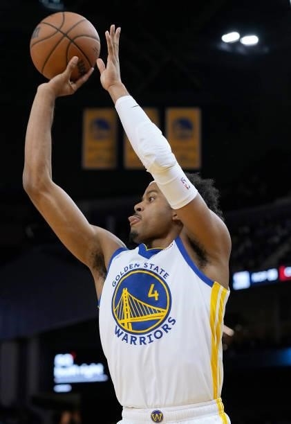 Moses Moody of the Golden State Warriors shoots a three-point shot against the Los Angeles Lakers at Chase Center on October 08, 2021 in San...