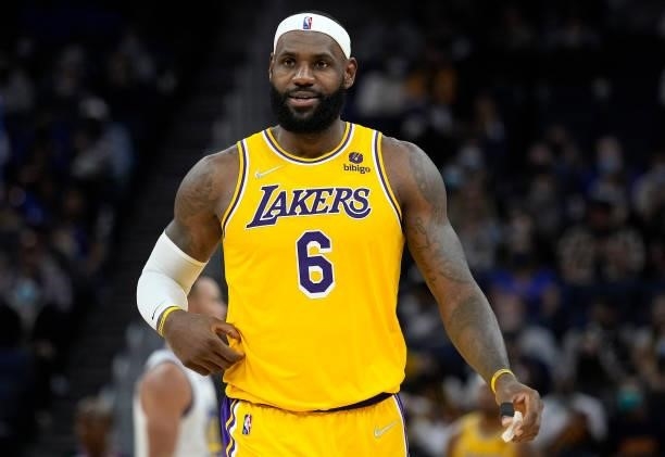 LeBron James of the Los Angeles Lakers looks on against the Golden State Warriors at Chase Center on October 08, 2021 in San Francisco, California....