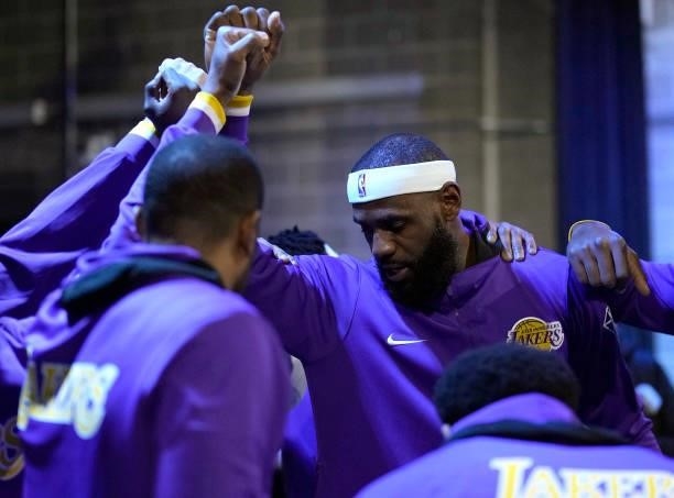 LeBron James of the Los Angeles Lakers gathers his team together outside the locker room prior to playing the Golden State Warriors at Chase Center...