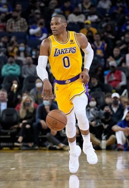 Russell Westbrook of the Los Angeles Lakers dribbles the ball up court against the Golden State Warriors at Chase Center on October 08, 2021 in San...