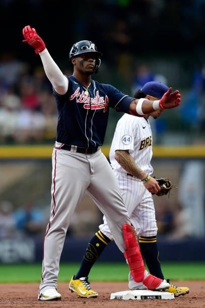 Jorge Soler of the Atlanta Braves reacts after hitting a double in the third inning during game 2 of the National League Division Series against the...