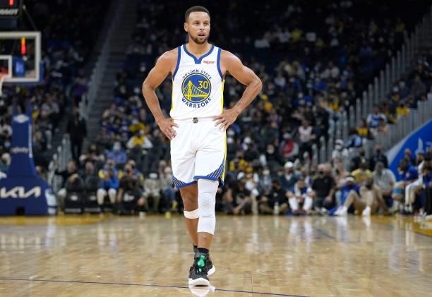 Stephen Curry of the Golden State Warriors looks on against the Los Angeles Lakers at Chase Center on October 08, 2021 in San Francisco, California....