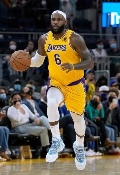 LeBron James of the Los Angeles Lakers dribbles the ball up court against the Golden State Warriors at Chase Center on October 08, 2021 in San...