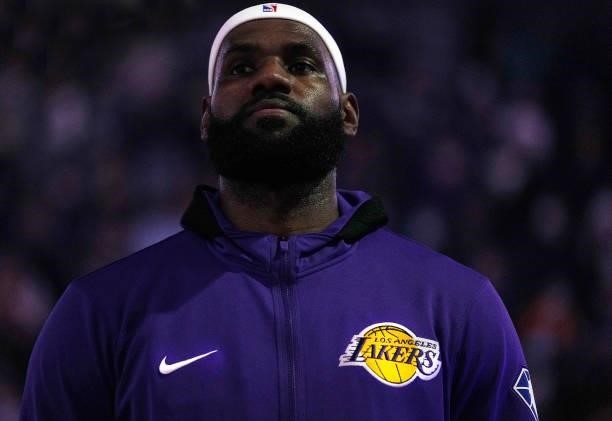 LeBron James of the Los Angeles Lakers stands during the singing of the National Anthem prior to playing the Golden State Warriors at Chase Center on...