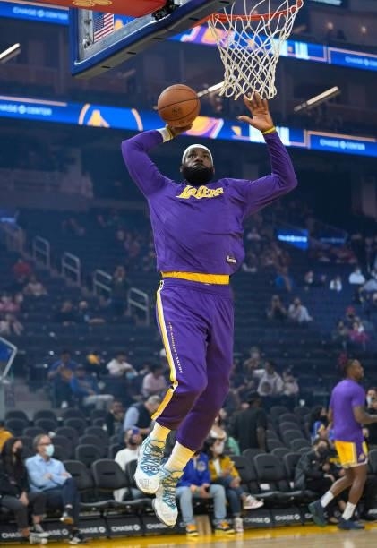 LeBron James of the Los Angeles Lakers warms up prior to the start of the game against the Golden State Warriors at Chase Center on October 08, 2021...