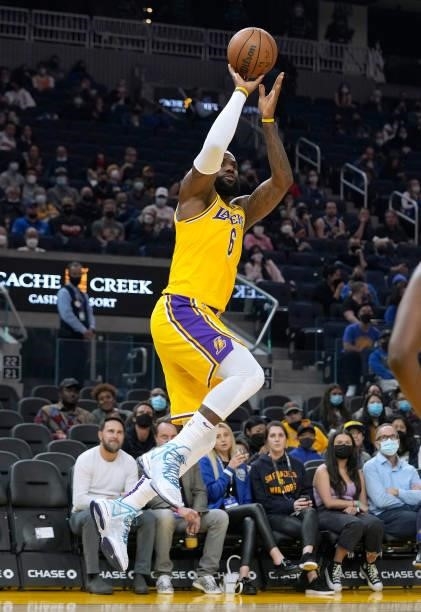 LeBron James of the Los Angeles Lakers shoots against the Golden State Warriors at Chase Center on October 08, 2021 in San Francisco, California....