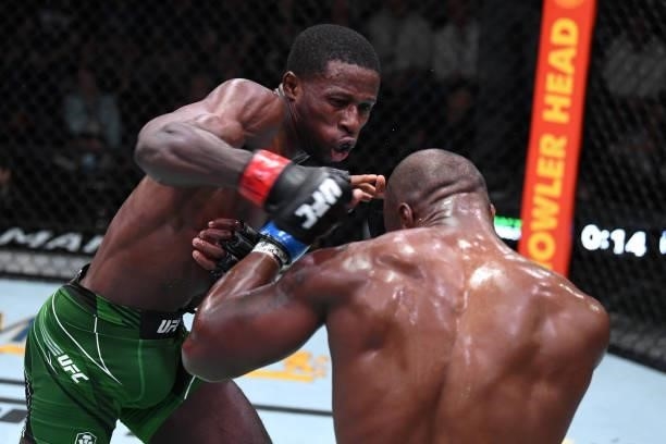 Randy Brown of Jamaica punches Jared Gooden in their welterweight bout during the UFC Fight Night event at UFC APEX on October 09, 2021 in Las Vegas,...