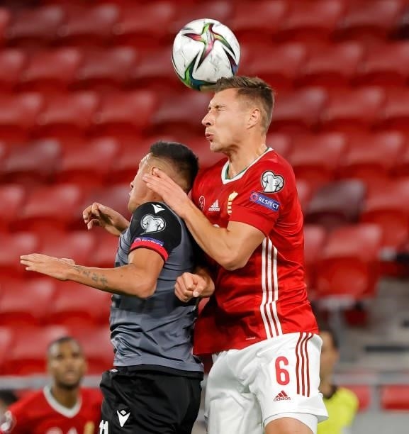 Willi Orban of Hungary battles for the ball in the air with Myrto Uzuni of Albania during the FIFA World Cup 2022 Qatar Qualifier match between...