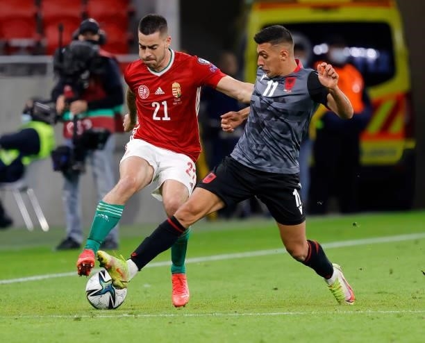 Myrto Uzuni of Albania challenges Endre Botka of Hungary during the FIFA World Cup 2022 Qatar Qualifier match between Hungary and Albania at Puskas...
