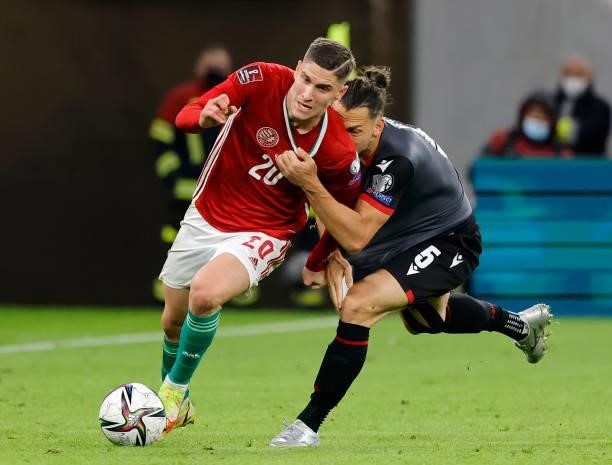 Frederic Veseli of Albania fouls Roland Sallai of Hungary during the FIFA World Cup 2022 Qatar Qualifier match between Hungary and Albania at Puskas...