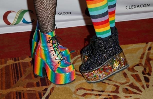 Actress Mary Chieffo and actor/writer Madi Goff, shoes detail, attend the ClexaCon 2021 convention at the Tropicana Las Vegas on October 09, 2021 in...