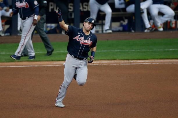 Austin Riley of the Atlanta Braves hits a home run in the sixth inning during game 2 of the National League Division Series against the Milwaukee...