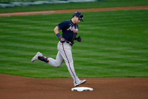 Austin Riley of the Atlanta Braves runs the bases after hitting a home run in the sixth inning during game 2 of the National League Division Series...