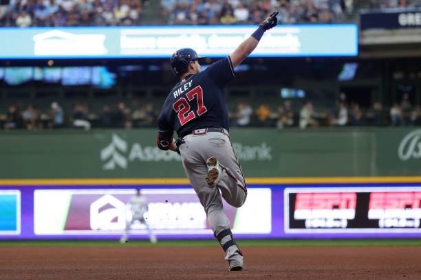 Austin Riley of the Atlanta Braves hits a solo home run in the sixth inning during game 2 of the National League Division Series against the...