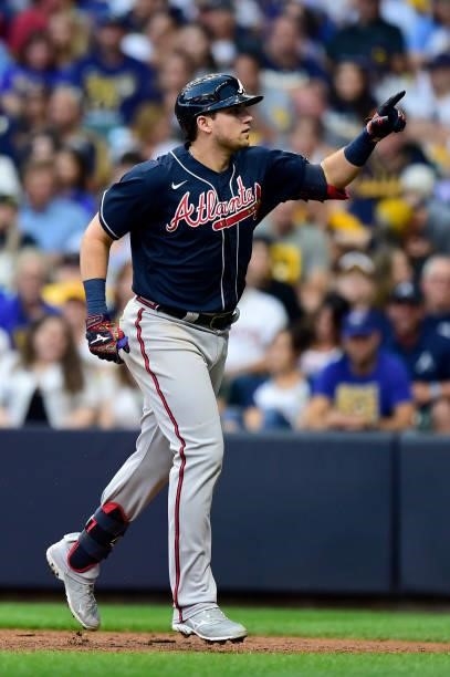 Austin Riley of the Atlanta Braves points to the fans after hitting a home run in the sixth inning during game 2 of the National League Division...
