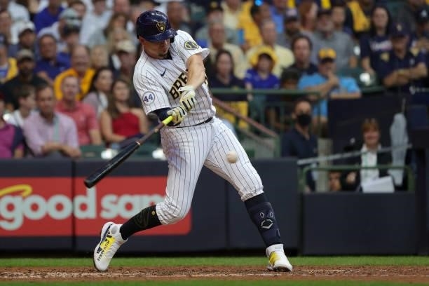 Willy Adames of the Milwaukee Brewers hits a double in the sixth inning during game 2 of the National League Division Series against the Atlanta...