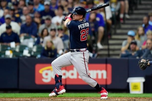 Joc Pederson of the Atlanta Braves hits a single in the seventh inning during game 2 of the National League Division Series against the Milwaukee...