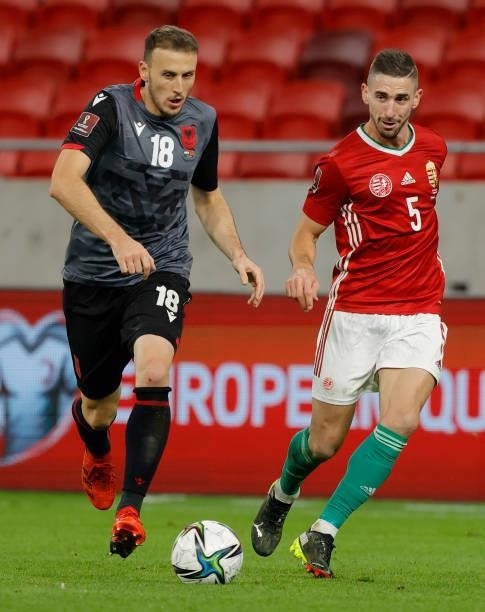 Ardian Ismajli of Albania competes for the ball with Zsolt Nagy of Hungary during the FIFA World Cup 2022 Qatar Qualifier match between Hungary and...