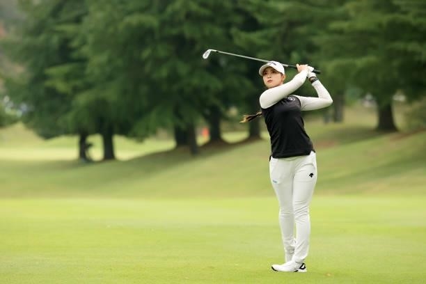 Asuka Kashiwabara of Japan hits her second shot on the 1st hole during the final round of the Stanley Ladies at Tomei Country Club on October 10,...