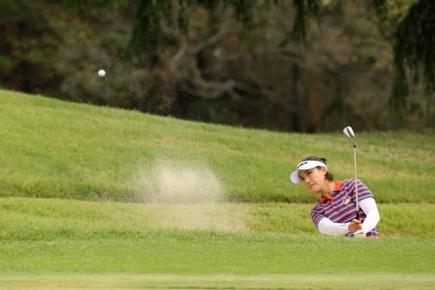 Mi-jeong Jeon of South Korea hits out from a bunker on the 1st hole during the final round of the Stanley Ladies at Tomei Country Club on October 10,...