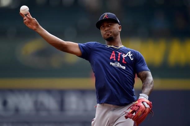 Ozzie Albies of the Atlanta Braves warms up prior to game 2 of the National League Division Series against the Milwaukee Brewers at American Family...