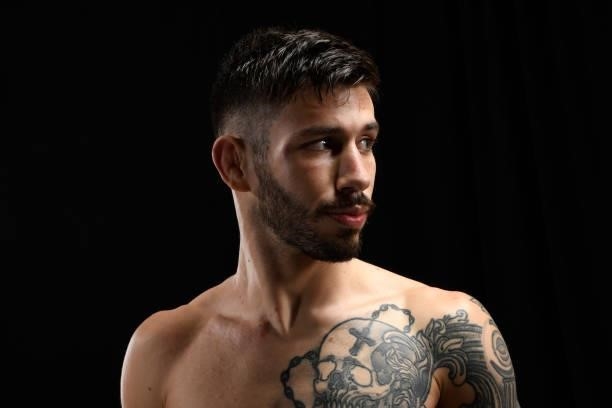 Matheus Nicolau of Brazil poses for a portrait backstage during the UFC Fight Night event at UFC APEX on October 09, 2021 in Las Vegas, Nevada.
