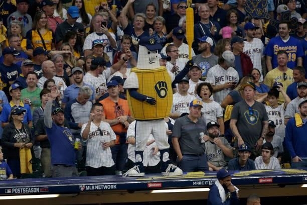 Milwaukee Brewers mascots dances on the dugout in the seventh inning during game 2 of the National League Division Series against the Atlanta Braves...