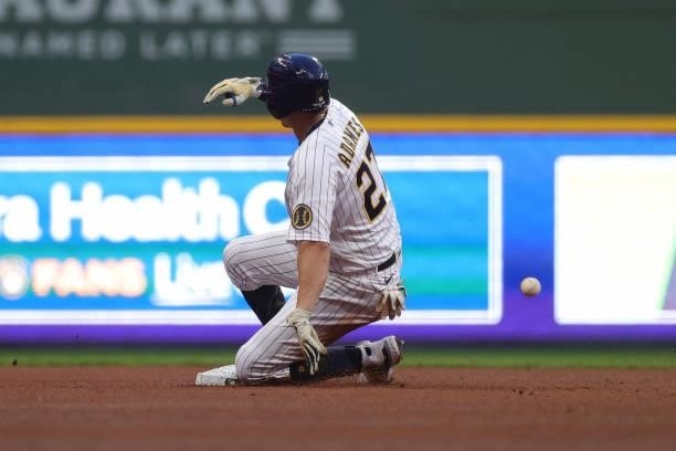 Willy Adames of the Milwaukee Brewers slides into second after hitting a double in the sixth inning during game 2 of the National League Division...