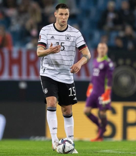 Niklas Suele of Germany runs with the ball during the 2022 FIFA World Cup Qualifier match between Germany and Romania at Imtech Arena on October 08,...