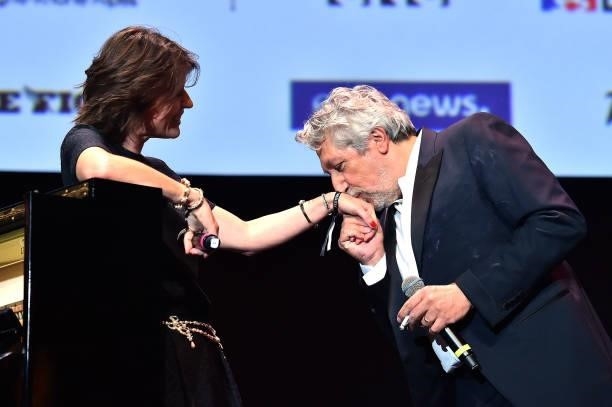 Irene Jacob and Alain chabat attends the opening ceremony during the 13th Film Festival Lumiere In Lyon on October 09, 2021 in Lyon, France.