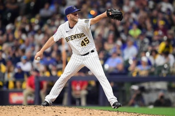 Brad Boxberger of the Milwaukee Brewers pitches in the ninth during game 2 of the National League Division Series against the Atlanta Braves at...
