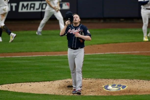 Tyler Matzek of the Atlanta Braves reacts after a strike out in the eighth inning during game 2 of the National League Division Series against the...