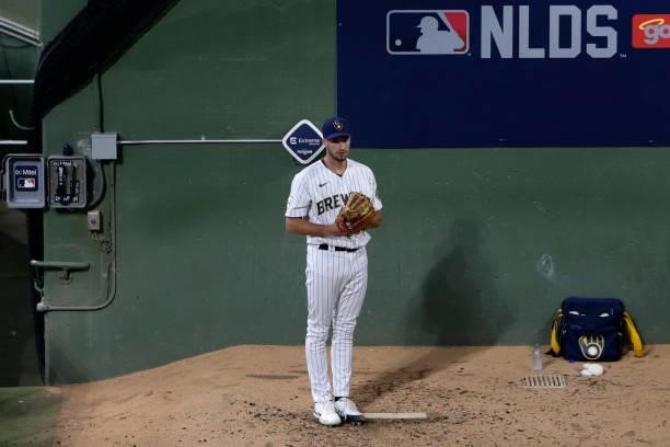 Aaron Ashby of the Milwaukee Brewers warms up in the seventh inning during game 2 of the National League Division Series against the Atlanta Braves...