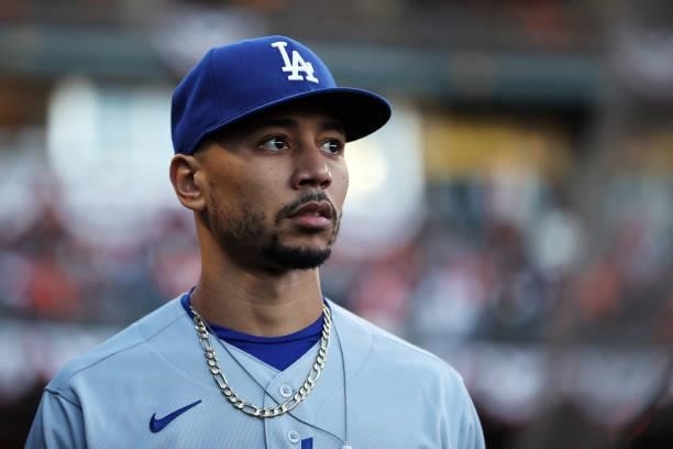 Mookie Betts of the Los Angeles Dodgers walks through the dugout before Game 2 of the National League Division Series against the San Francisco...