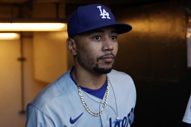 Mookie Betts of the Los Angeles Dodgers walks through the dugout before Game 2 of the National League Division Series against the San Francisco...