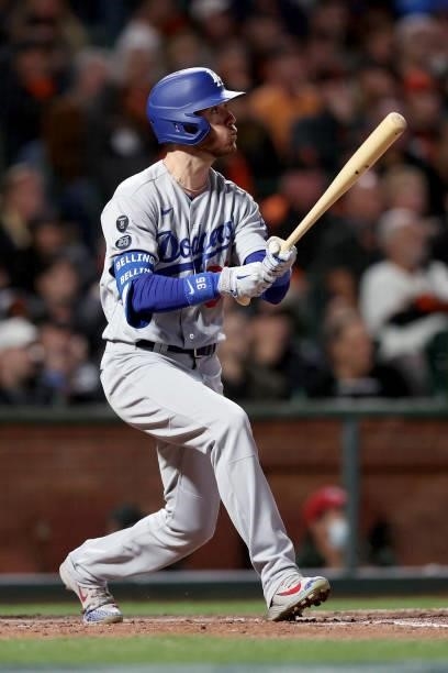 Cody Bellinger of the Los Angeles Dodgers hits an RBI double in the sixth inning against the San Francisco Giants during Game 2 of the National...