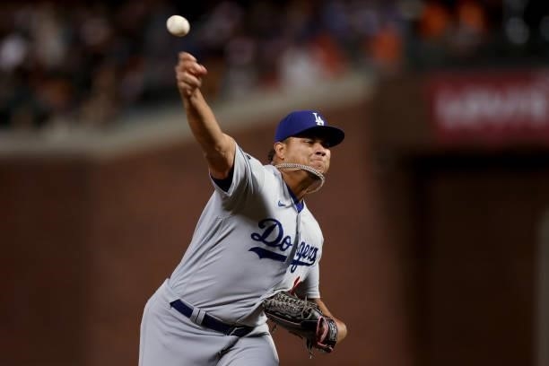 Brusdar Graterol of the Los Angeles Dodgers pitches in the eighth inning against the San Francisco Giants during Game 2 of the National League...