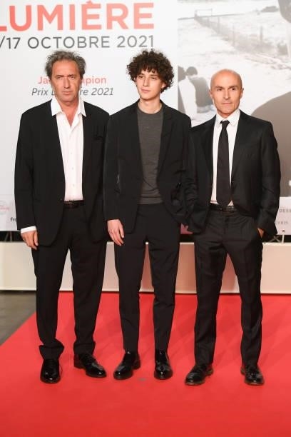 Paolo Sorrentino, Filippo Scotti and Lorenzo Mieli attend the opening ceremony during the 13th Film Festival Lumiere In Lyon on October 09, 2021 in...