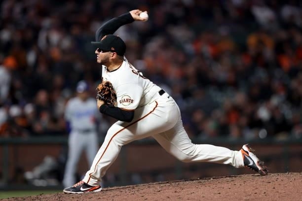 Kervin Castro of the San Francisco Giants pitches in the ninth inning against the Los Angeles Dodgers during Game 2 of the National League Division...