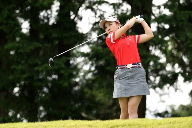 Ayako Kimura of Japan hits her tee shot on the 15th hole during the final round of the Stanley Ladies at Tomei Country Club on October 10, 2021 in...