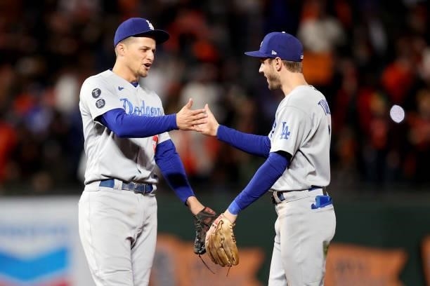 Corey Seager and Trea Turner of the Los Angeles Dodgers celebrate after beating the San Francisco Giants 9-2 in Game 2 of the National League...