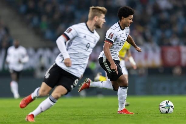 Serge Gnabry of Germany runs with the ball during the 2022 FIFA World Cup Qualifier match between Germany and Romania at Imtech Arena on October 08,...