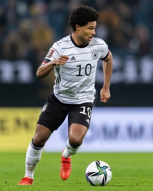 Serge Gnabry of Germany runs with the ball during the 2022 FIFA World Cup Qualifier match between Germany and Romania at Imtech Arena on October 08,...