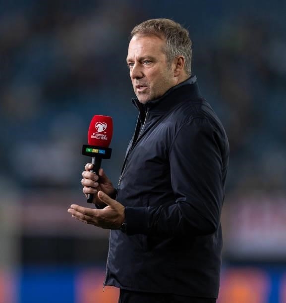 Head coach Hansi Flick of Germany gives an interview during the 2022 FIFA World Cup Qualifier match between Germany and Romania at Imtech Arena on...