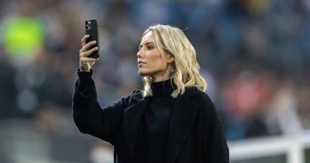 Presenter Laura Papendick takes a selfie prior to the 2022 FIFA World Cup Qualifier match between Germany and Romania at Imtech Arena on October 08,...
