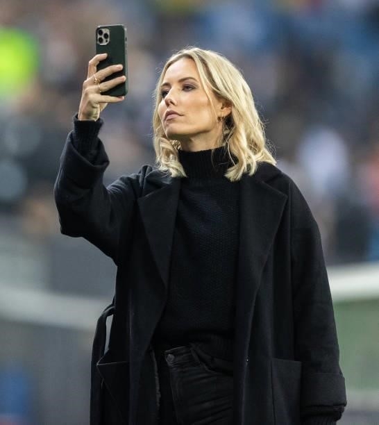 Presenter Laura Papendick takes a selfie prior to the 2022 FIFA World Cup Qualifier match between Germany and Romania at Imtech Arena on October 08,...
