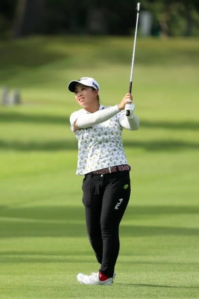 Mao Saigo of Japan hits her second shot on the 14th hole during the final round of the Stanley Ladies at Tomei Country Club on October 10, 2021 in...